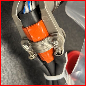 Back-shell clamp tape bushing